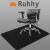 Black office chair mat, 100 x 140 cm, for hard floors, protects against scratches, chair shown in use
