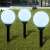 Białe solarne lampy ogrodowe w kształcie kuli, 3 sztuki, SL-10591, w użyciu