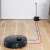 Dreame Bot L10 Pro robot vacuum cleaner, cleaning a room and returning to charging station