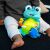 Baby sitting and playing with Baby Einstein Neptune's Sensory Sidekick Turtle