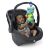 Baby playing with Baby Einstein Neptune's Sensory Sidekick Turtle attached to car seat