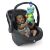 Baby playing with Baby Einstein Neptune's Sensory Sidekick Turtle attached to car seat