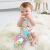 Baby playing with SKIP HOP Unicorn Teething Toy