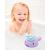 Little girl playing with Skip Hop Narwhal bath toy
