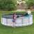 Bestway Power Steel pool cover, 427cm diameter, black, being installed