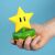 Nahaufnahme der Super Mario Super Star Icon Lampe in der Hand