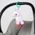 BRIGHT STARTS Sparkle & Shine Unicorn Plush Baby Toy with C-Clip attached to a stroller