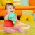Baby playing with BRIGHT STARTS Tug Tunes Elephant Plush Musical Toy