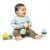Baby playing with Ingenuity Calm Springs Plush Plant Rattles