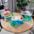 Zestaw do zabawy Baby Einstein Magic Touch Kitchen, kasa fiskalna Baby Einstein Magic Touch i koszyk na zakupy Baby Einstein Magic Touch