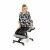 Woman sitting on Rufus ergonomic kneeling chair, light grey