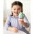 Child holding a SKIP HOP Zoo Sweet Scoops Ice Cream Stacking Set with Color Changing Scoops, Unicorn, and Rainbow Stand
