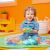 Baby playing on Bright Starts Wild Wiggles Activity Gym