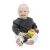 Baby holding Baby Einstein Cal-a-Puller rattle toy