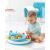 Baby playing with Skip Hop Explore & More Let's Roll Activity Table on the floor
