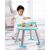 Toddler playing with Skip Hop Explore & More Let's Roll Activity Table standing up