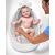 Baby in Skip Hop Moby bathtub with sling, supported by parent