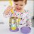 Toddler eating from Skip Hop Zoo Unicorn Food Thermos with Spork