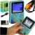 Retro mini handheld game console G5, blue and grey color, with colorful abstract design, with accessories