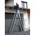KRAUSE CORDA 3x9 multi-purpose ladder in use, extended to reach gutter
