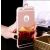 Tükör tok Apple iPhone 8-hoz, rózsa arany színben, a tok egy kézen látható