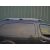 VW Caddy 2004-2009 tetősómagtartó ródszer felszerelve egy szürke furgonra, oldalnézet