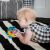 Baby playing with OBALL Einstein Neptune Turtle Car Toy