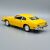 Hátulnézet egy sárga 1974-es Ford Maverick 1:24 méretarányú modell autónak a Motor Max-tól