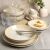 Ambition Playa 18-piece beige dinnerware set in use