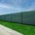 Springos Shade Net installed on a fence, green, 90% shade