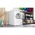 Bosch WTH83256BY szárítógép egy mosókonyhai környezetben, nyitott ajtóval