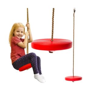 Gyerek játszik a Kruzzel piros korong hintán - Kruzzel