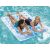 Dwie kobiety relaksują się na materacu dmuchanym Bestway Double Pool Lounger w basenie