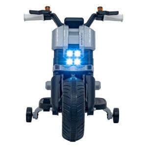 Widok z przodu motocykla elektrycznego Future QLS-805 dla dzieci, pokazujący białe siedzenie i turkusowo-czarny wzór - Ramiz Pojazd elektryczny