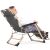 Woman relaxing on Springos Gray Folding Garden Lounger, side profile