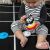 Baby spielt mit Baby Einstein Stack & Wobble Zen Zebra Stapelspielzeug