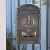STR 252261 bronze aluminum mailbox on gate