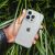 Raptic X-Doria átlátszó tok iPhone 14 Pro Max készüléken, kézben