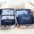 Set of 6 dark blue travel organizers for suitcase, clothes, shoes, and toiletries