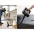Gorenje SVC216300FLA vacuum cleaner in use cleaning floor and sofa