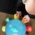 Close up of baby hands playing with Baby Einstein Go Opus Go toy