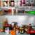 White spice rack organizer in a kitchen cabinet, before and after organization