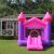 Pepita Castle inflatable bouncy house in backyard setting