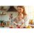 Woman using Berdsen Hand Blender to make a smoothie