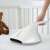 Deerma CM800 UV anti-mite vacuum cleaner in use on a crib mattress