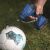 Scheppach C-AC20-X cordless air compressor, 20V, inflating a soccer ball