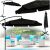 Black cantilever garden parasol with garden furniture