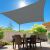 Springos dark grey shade sail over outdoor dining area