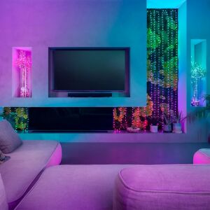Lumini Twinkly Candies LED folosite ca iluminat decorativ într-un living modern - Crăciun