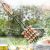 InnovaGoods Kolbászgrill használat közben egy BBQ grillen